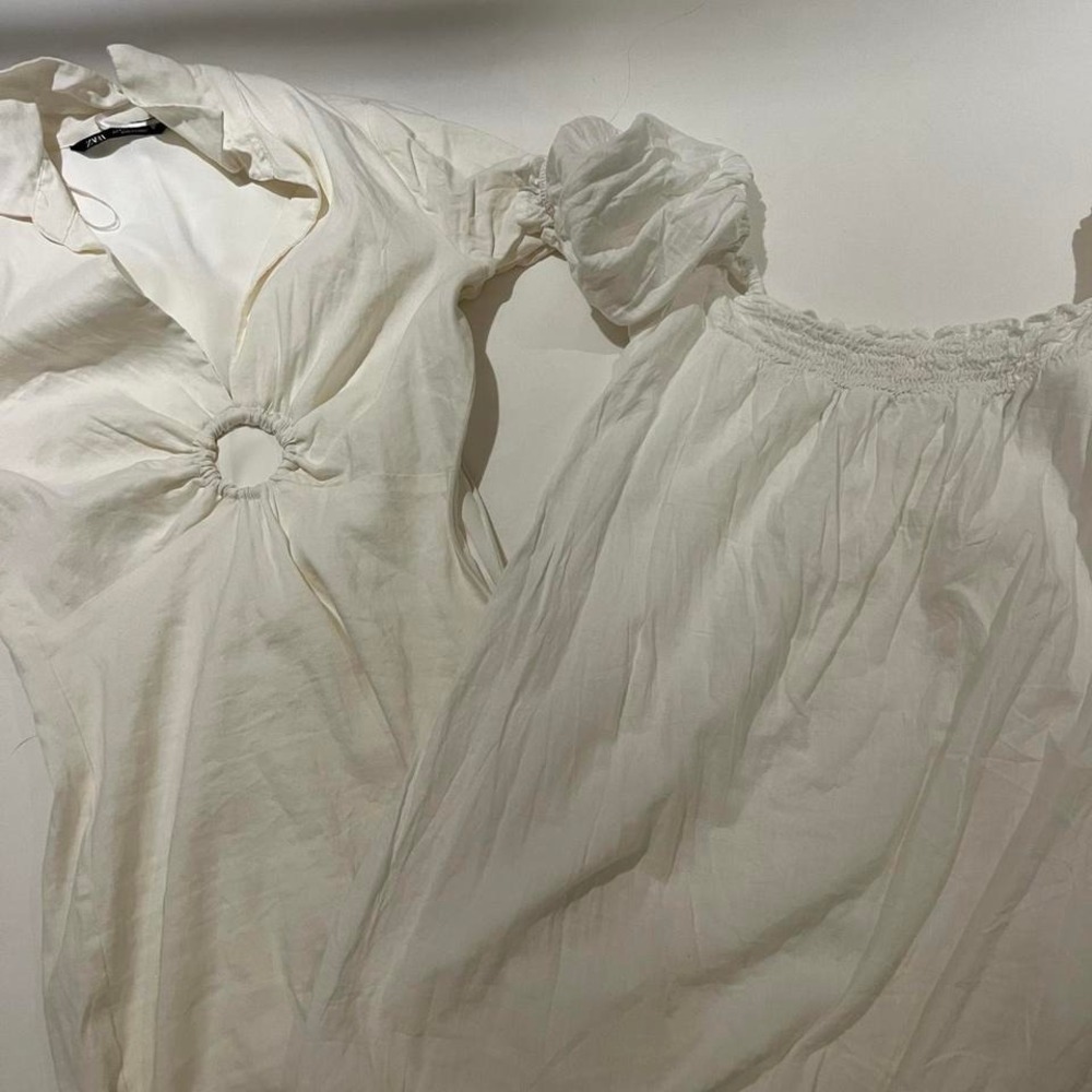 Two white mini dresses